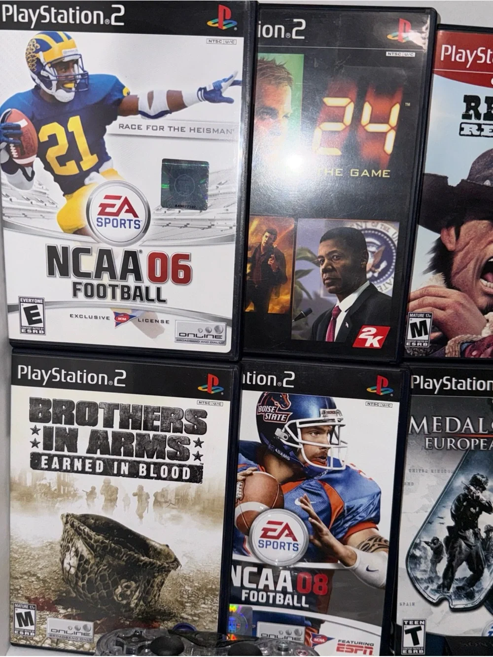 Sony PlayStation 2 Slim Console Bundle in Black with games and Controllers